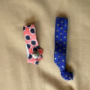 2 colorful polka dot hair ties-1 elastic & 1 button closure! New!
